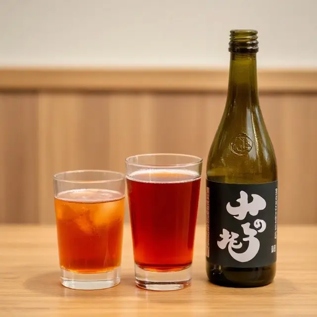 A bottle and cup of sake